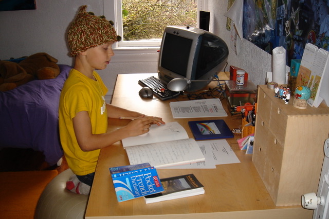 Young Oskar with Froggie on his desk